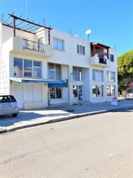 Cheap Building with Shops and Apartments