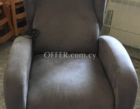 Electric reclining armchair with lift function