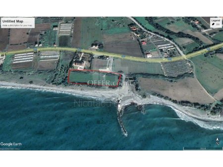 Seafront land for sale in Maroni