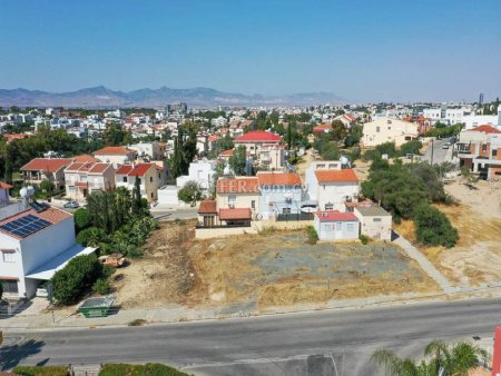 Available for sale is the 1 2 undivided share of a residential plot in Egkomi Municipality of Nicosia District.