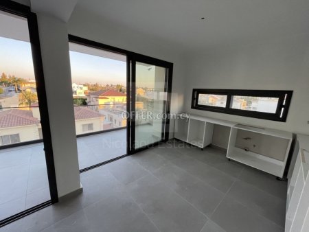 Two bedroom apartment with a 42sq.m roof garden in a building with gym and playground in Makedonitissa - 10