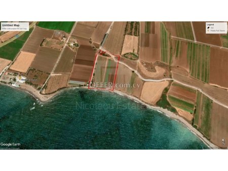 Seafront land for sale in Timi