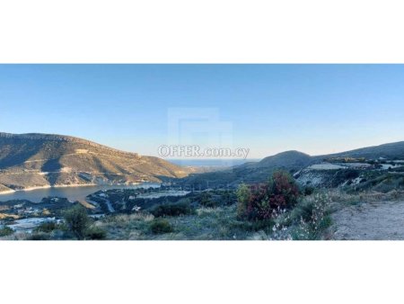 Large parcel of land with beautiful views of Germasogia Dam and the sea in Akrounta area