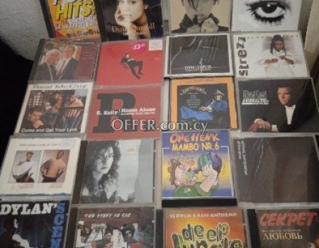100 original slightly used and new CDs songs.
