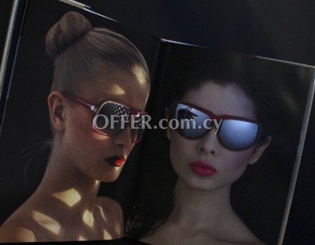 Exotic hardcover book photo collection of german photographer uwe ommer
