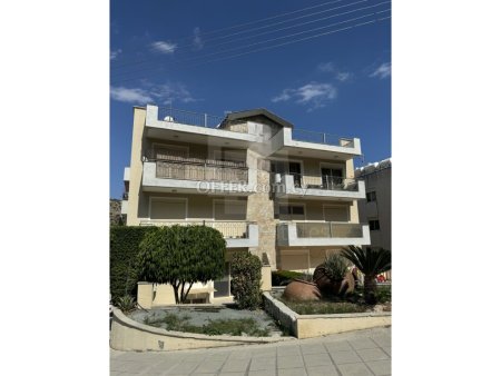 Fully renovated two bedroom penthouse with roof garden and private ground level yard in Germasogeia village