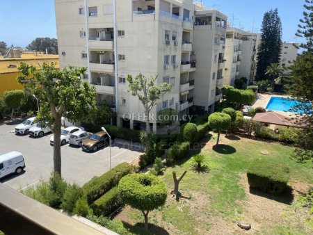 Large four bedroom apartment in a gated complex opposite the sea for sale.