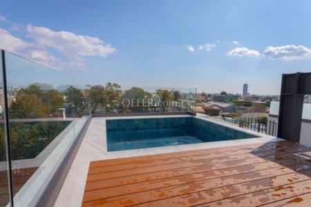 THREE BEDROOM PENTHOUSE WITH ROOF GARDEN AND POOL IN LIMASSOL CITY CENTER