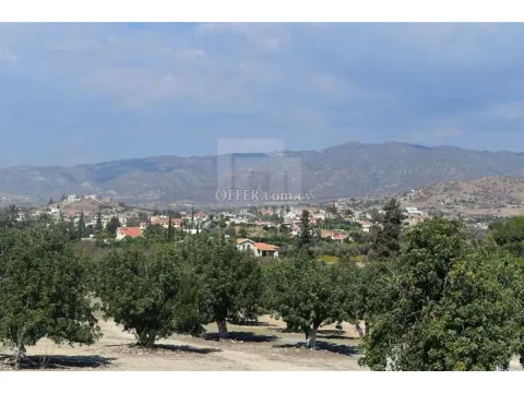 Large residential land in Pyrgos village - Main Photo