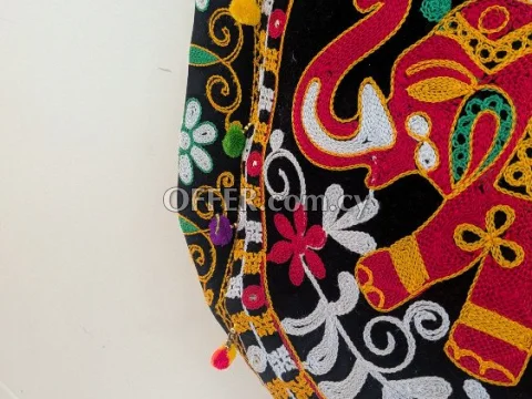 A traditional Rajasthani Jaipuri handwork sling bag in black - 2