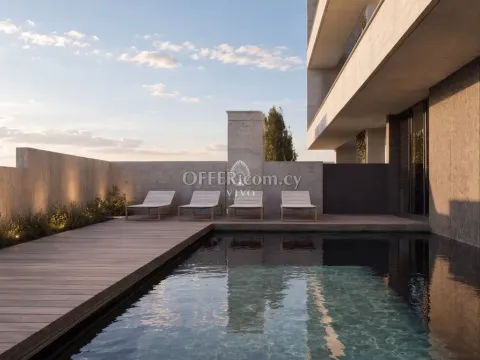 TOP FLOOR TWO BEDROOM APARTMENT IN AGIOS ATHANASIOS WITH COMMON FACILITIES AND ROOD GARDEN - Main Photo